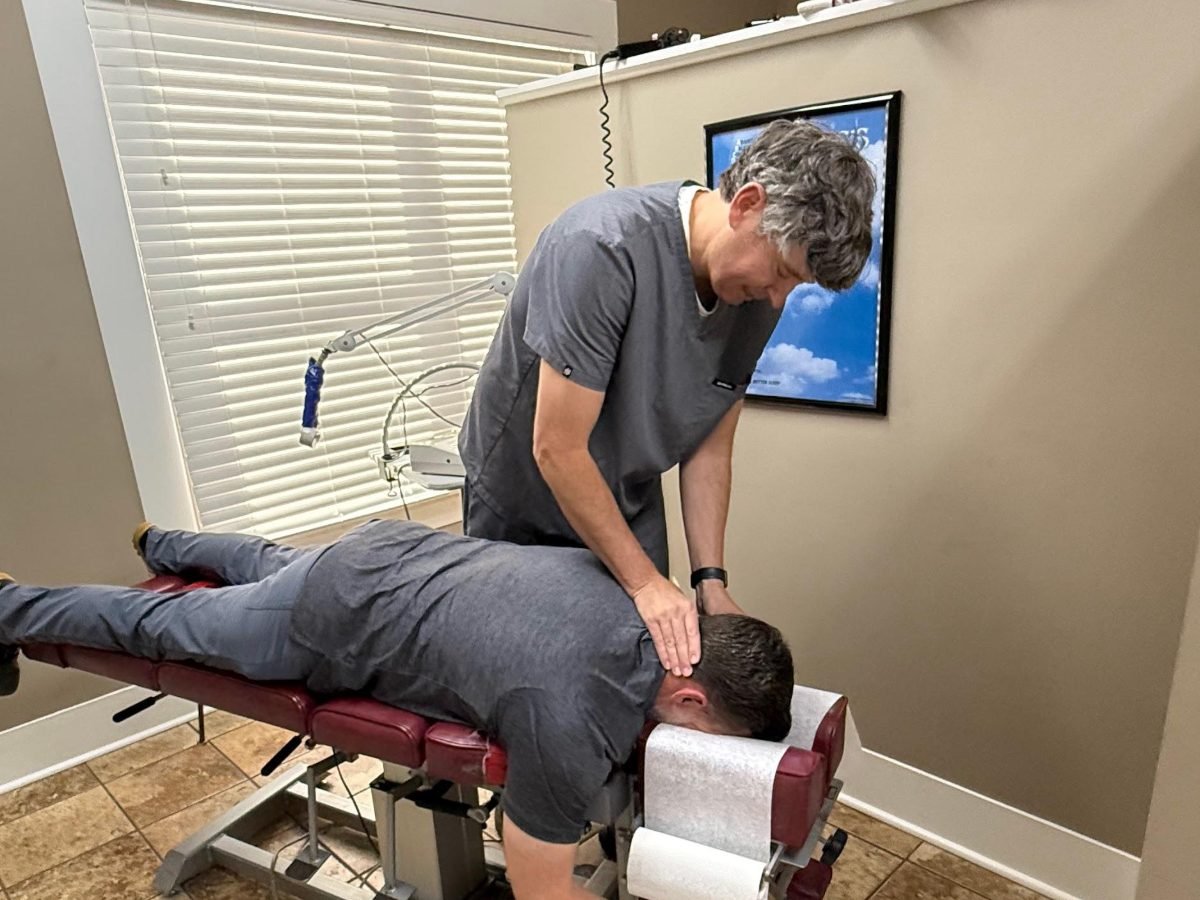 Chiropractic neck adjustment by Dr. Channing King, DC in Trussville, Alabama